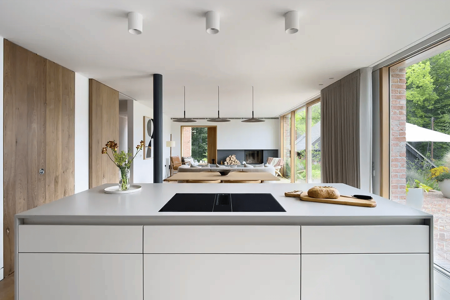 Modern kitchen featuring a Caesarstone Raw Concrete kitchen island