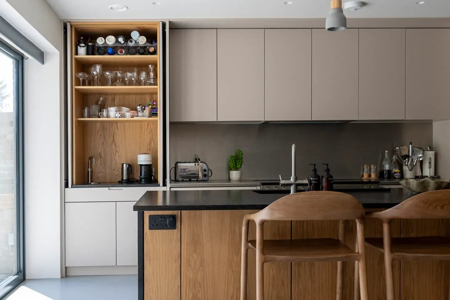 Close-up of Caesarstone Darcrest kitchen worktop and island in a modern kitchen