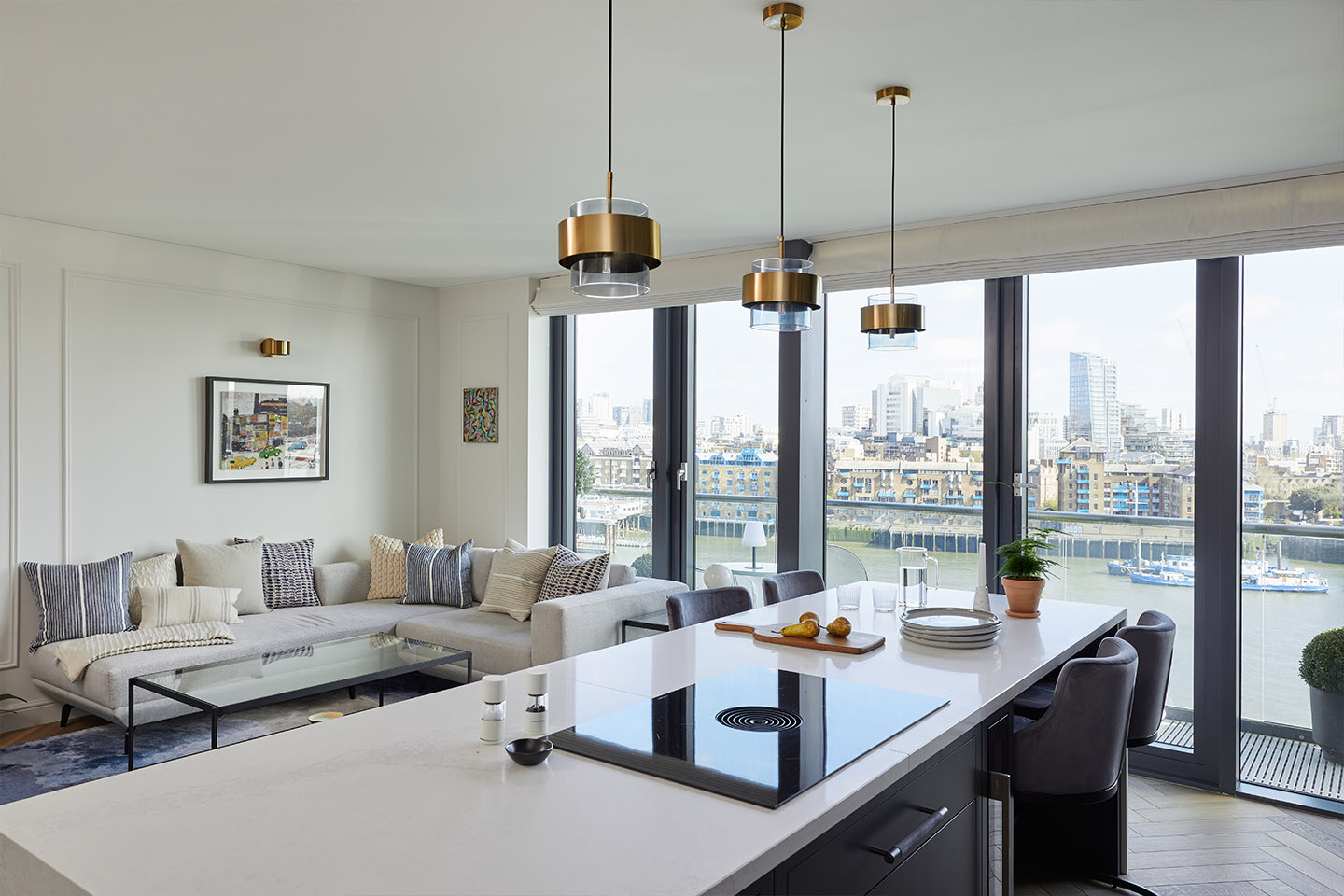 Open plan kitchen using Caesarstone Calacatta Nuvo kitchen island