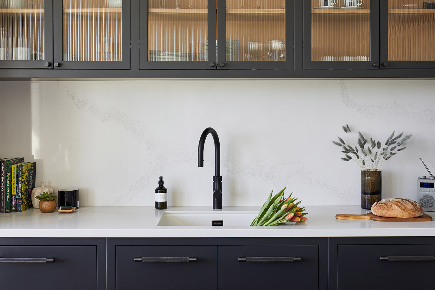 Close-up of Caesarstone Calacatta Nuvo worktop and splashback