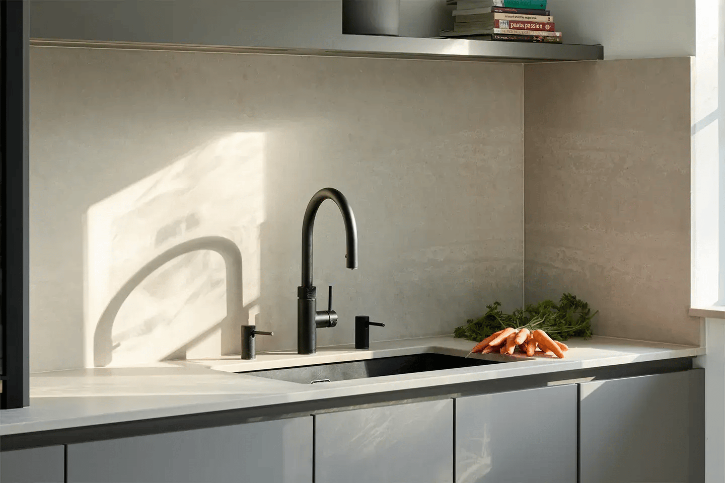 Close up of Caesarstone Topus Concrete kitchen worktop and backsplash