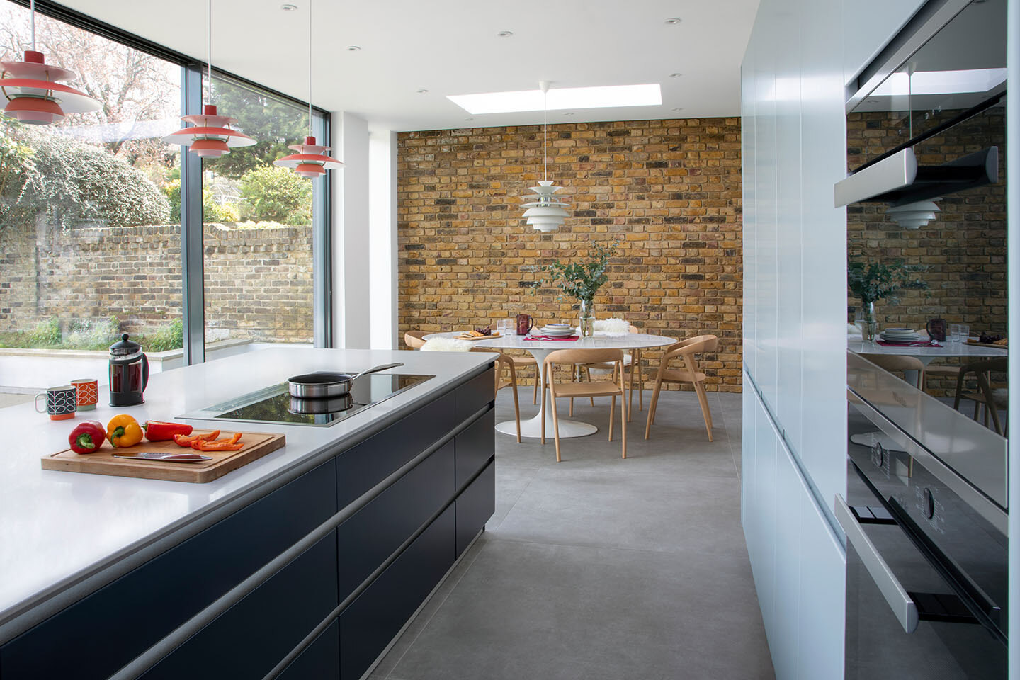 Modern kitchen with Caesarstone Misty Carrera kitchen island