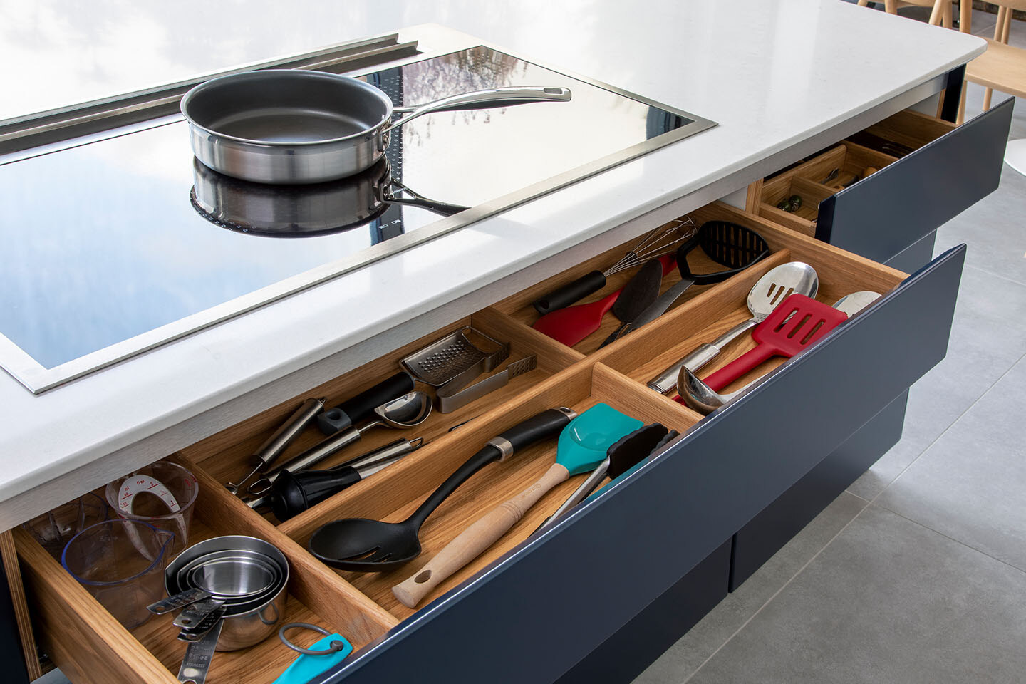 Caesarstone Misty Carrera quartz kitchen island with integrated hob