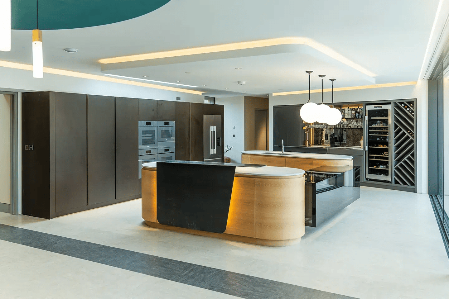 Contemporary kitchen featuring Caesarstone Airy Concrete kitchen islands