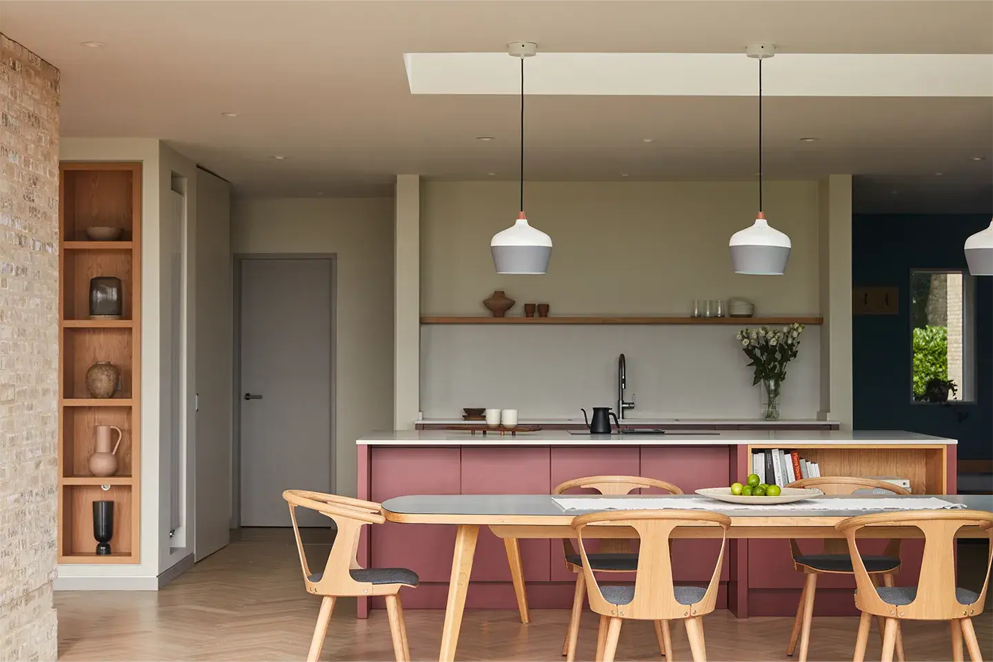 Contemporary family kitchen using Caesarstone 4001 Fresh Concrete worktops