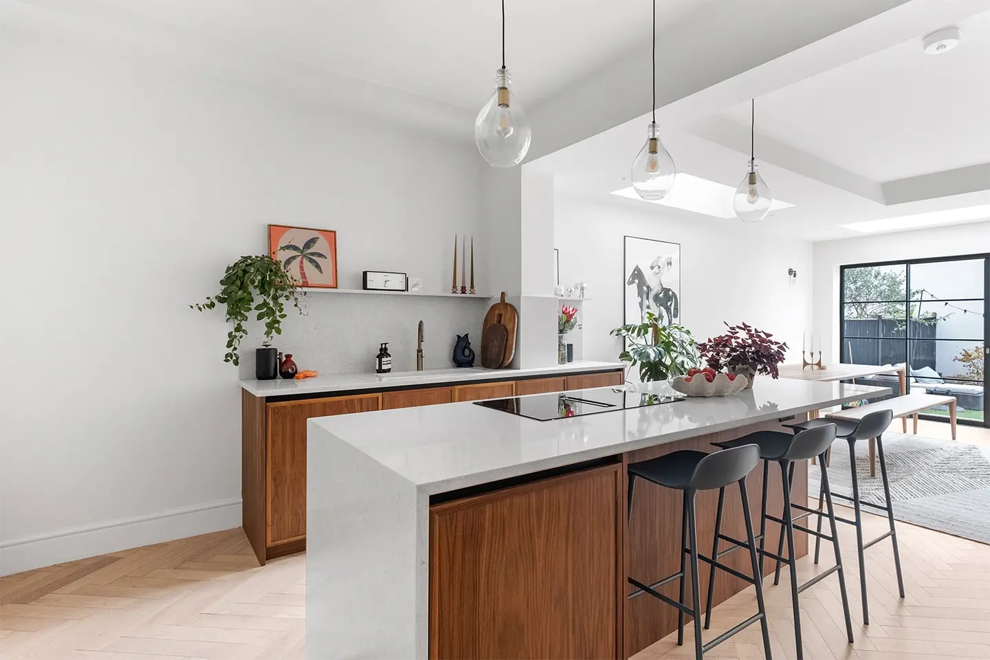 Caesarstone Bianco Drift worktops in a contemporary textured family kitchen