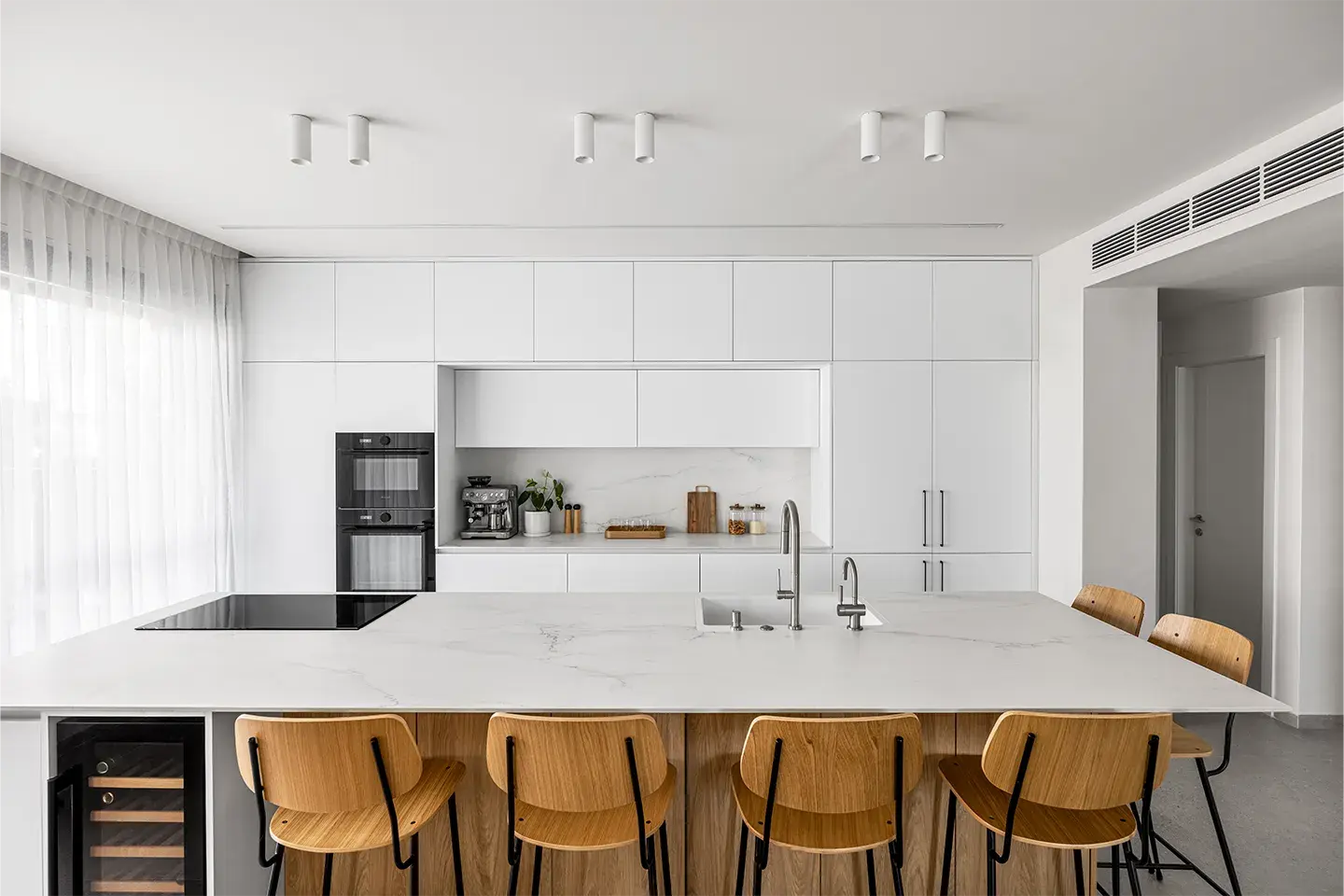 Caesarstone Snowdrift white porcelain worktops and kitchen island