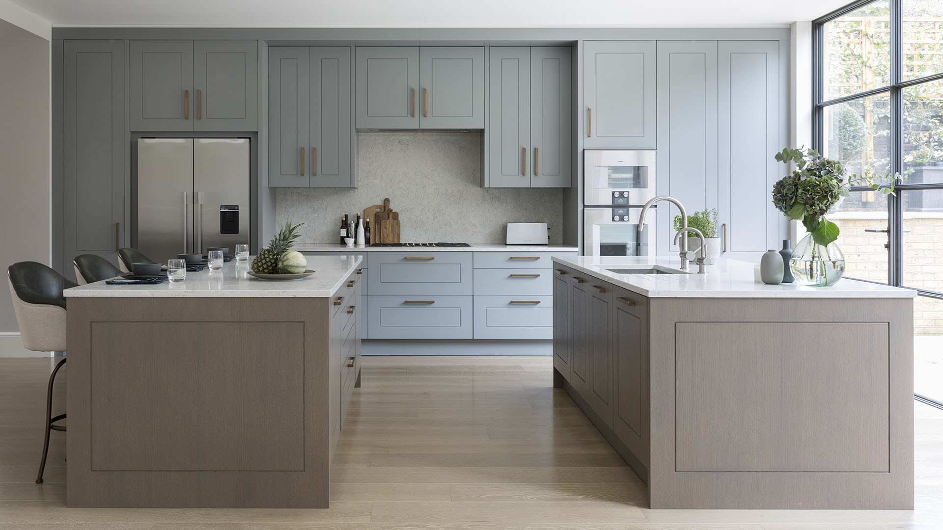 Caesarstone Bianco Drift worktops, splashback and kitchen islands