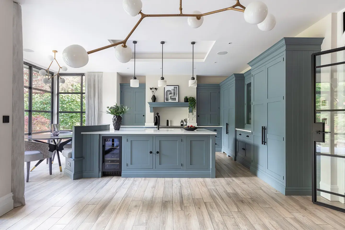 Caesarstone Organic White kitchen worktops in a blue Tom Howley kitchen